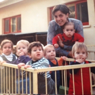 fr karen c 83-84 Liora (the adult) holding her baby+the kids